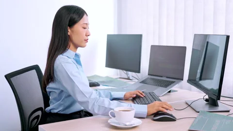 Asian woman programmer typing source code with computer pc Stock Footage 144202520