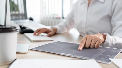 Asian Woman programmer typing source codes Programming On Computer in office, Foto stock