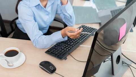 Asian woman programmer typing source code with computer pc for Developing pro Stock Photos