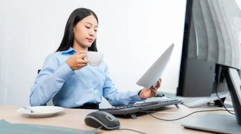Asian woman programmer typing source code with computer pc for Developing pro 写真素材