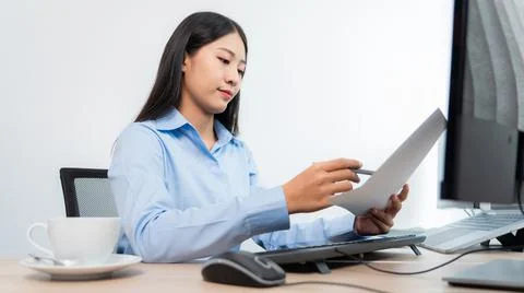 Asian woman programmer typing source code with computer pc for Developing pro 写真素材
