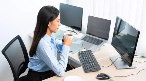 Asian woman programmer typing source code with computer pc for Developing pro 库存照片