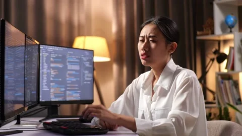 Asian Woman Programmer Yawning While Creating Innovative Software Engineer Stock Footage 232034400