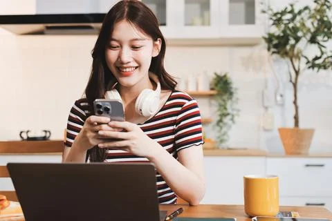 Asian woman using computer remote for business studying, watching online vi.. Фото