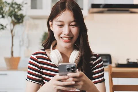 Asian woman using computer remote for business studying, watching online vi.. Stock Photos