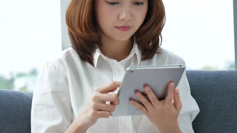 Asian woman using digital tablet shopping online, call, texting message internet Stock-Footage 154454645