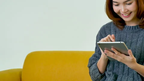 Asian woman using digital tablet shopping online, call, texting message internet Stock-Footage 156551141