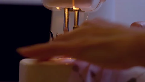 Asian woman using  sewing machine Stock Footage 131415837