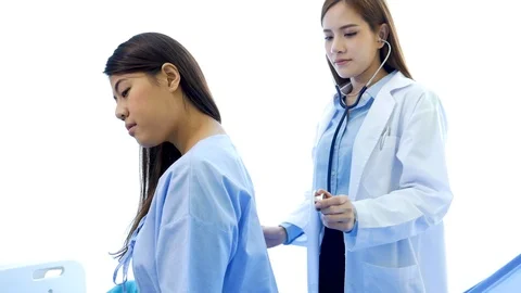 Asian women doctors using stethoscope listen respiratory rate from lungs diagnos 스톡 동영상 124248376