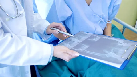 Asian women doctors using stethoscope listen respiratory rate Stock Footage 326282969