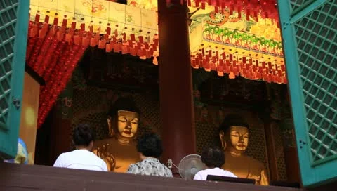 Asian women praying Buddha in temple Stock Footage
