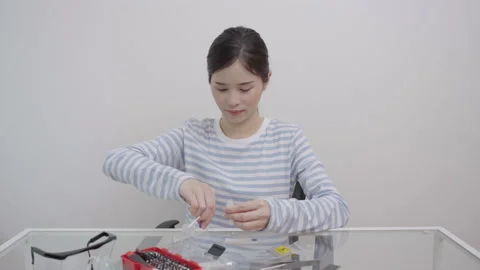 Asian wonman using rapids self-test of antigens COVID-19. Stock Footage 171400652