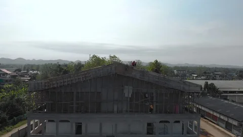 Asian worker building new stadium roof Stock Footage 88646060