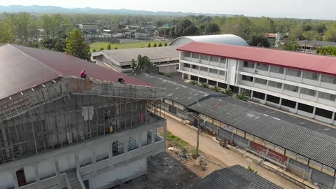 Asian worker building new stadium roof Stock Footage 88646199