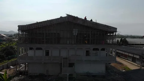 Asian worker building new stadium roof Video stock 88646543