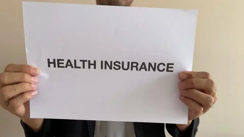 Asian worker crumpling paper message “HEALTH INSURANCE” then throw away Stock Footage 182284227