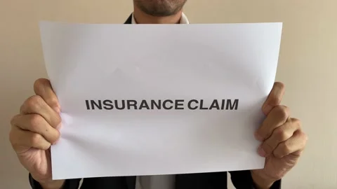 Asian worker crumpling paper message "INSURANCE CLAIM" then throw away Stock Footage 182284551