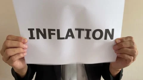Asian worker crumpling paper written message “INFLATION” then throw away Stock Footage 182285320