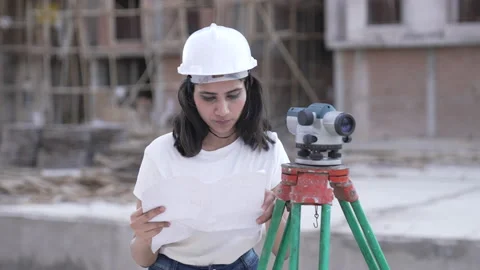 Asian Worker Making Project using site plans. Stockbeeldmateriaal 161808895