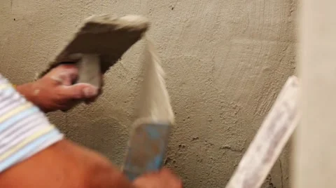 Asian worker plastering concrete wall Stock-Footage 55727225