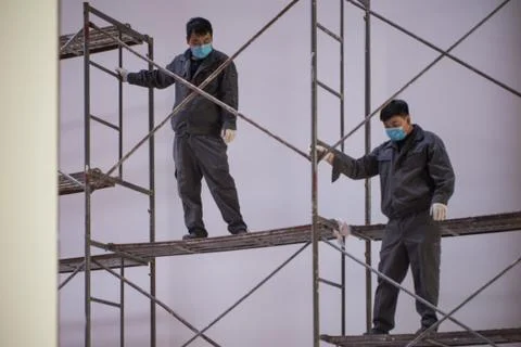 Asian workers with masks Stock Photos