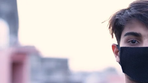 Asian young Boy With mask on face during Depressed Giving Expression Hopeless Stock Footage 128501752
