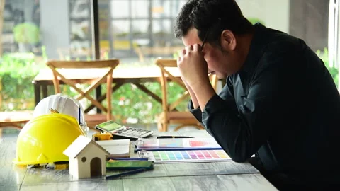 Asian young engineer man stress and failure in architecture project Stockbeeldmateriaal 247425127