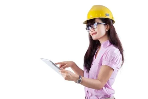 Asian young engineer using digital tablet Stock Photos