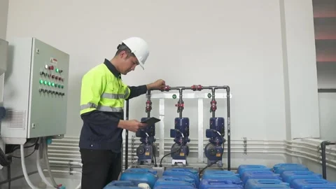 Asian young industrial engineer Control chemical systems. Stock-Footage 238432914