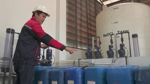 Asian young industrial engineer Control chemical systems. Video stock 238432938