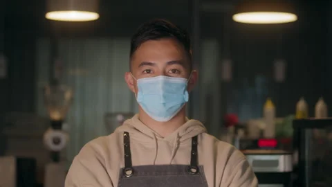 Asian young man remove protective mask at work, covid coronavirus , healthy 스톡 동영상 136201320