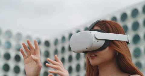 Asian young woman using virtual reality glasses Stock Footage 201114445