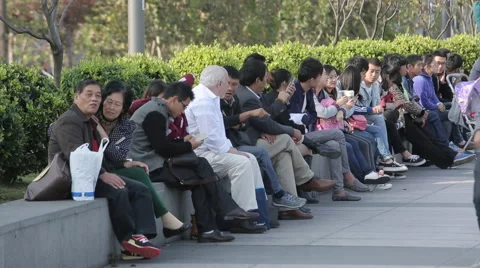 Asians crowd sitting on the bench Stock Footage 44421698