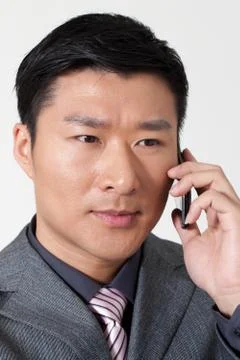 Asians Oriental Vertical composition Confidence Face Staff Indoor Success Adult Stock Photos