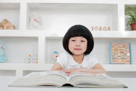 Asians Transverse composition Education 5 to 10. Alone Kid. Book Oriental Stock Photos