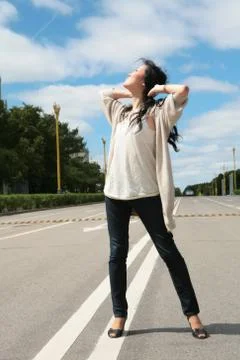 Asiatic model on the road Stock Photos