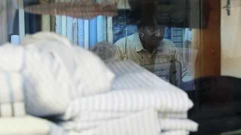 Asiatic Tailorist Working in a Store Stock Footage 81528557