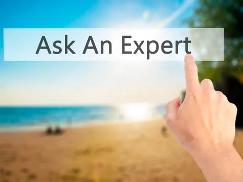 Ask An Expert - Hand pressing a button on blurred background concept on visua Stockfoto's