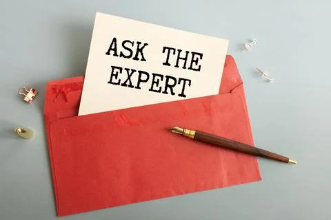 ASK THE EXPERTS a cup of coffee. glasses Stock Photos