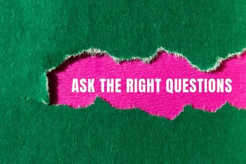 Ask The Right Questions message written on ripped torn paper background. Co.. Stock Photos