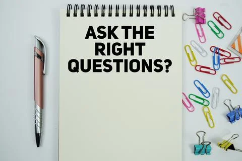 Ask The Right Questions? text message written on notepad with stationery fl.. Stock Photos