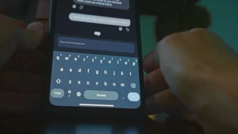 Asking Chat Bot on smartphone questions on medical topics Stock Footage 288969241