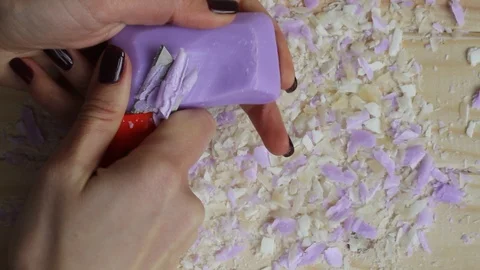 ASMR. Cut soap. Relax. Texture of soap shavings. Woman's hands. Close up Stock Footage 106716605