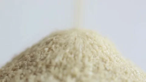 Asmr ,flowing sand pours into a pile it is a symbol of the passage of time, Stock Footage 174907830