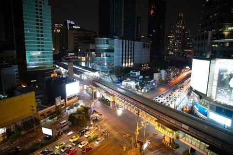 Asoke intersection and sky train station in Bangkok Thailand Photos