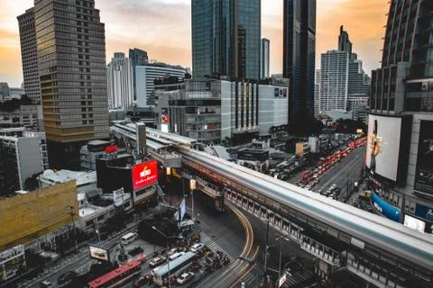 Asoke intersection and sky train station in Bangkok Thailand Photos