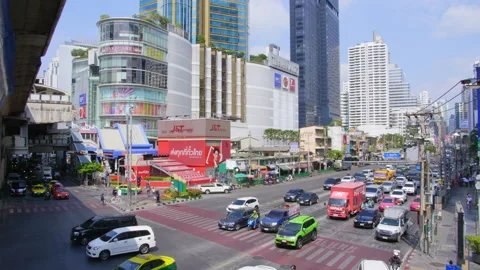 Asoke intersection with busy traffic, Bangkok, Thailand Video stock 231470683