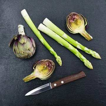 Asparagus with artichoke Stock Photos