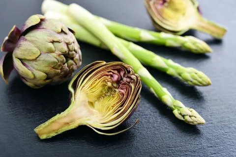 Asparagus with artichoke Stock Photos