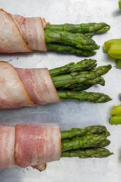 Asparagus with bacon Stock Photos